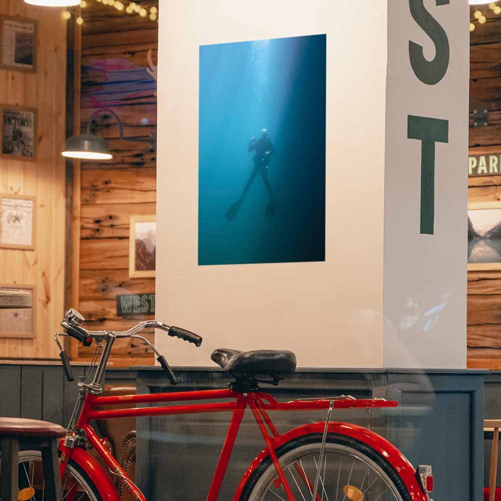 24 inch Going Up Scuba Poster Displayed on Column