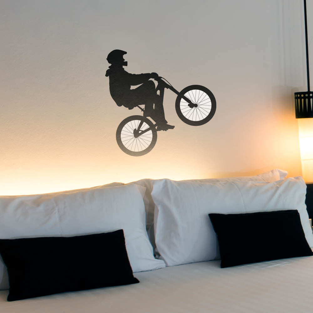 24 inch BMX Silhouette Wheelie Wall Decal Installed Above Bed