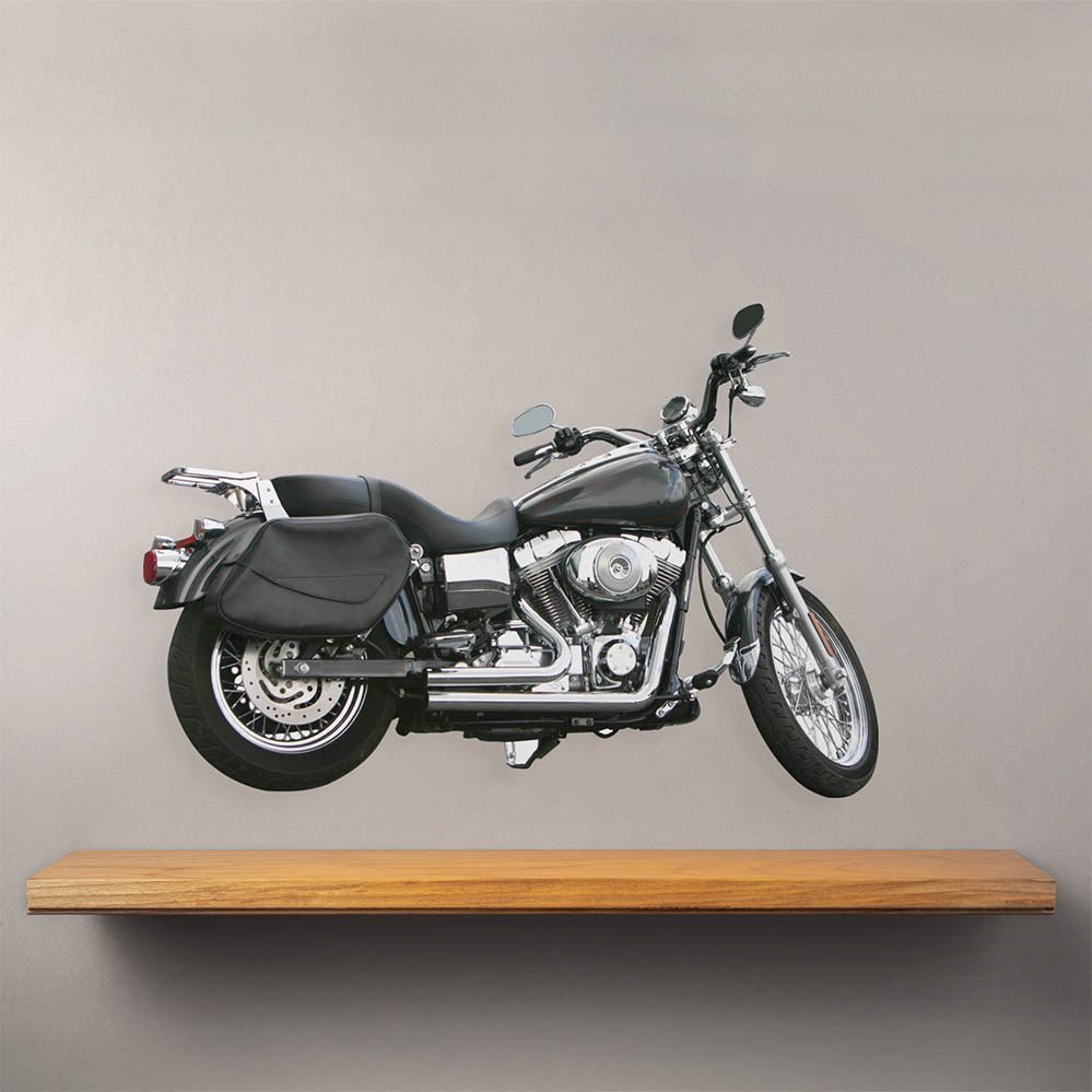 24 inch black and silver commuter motorcycle decal installed on wall above shelf