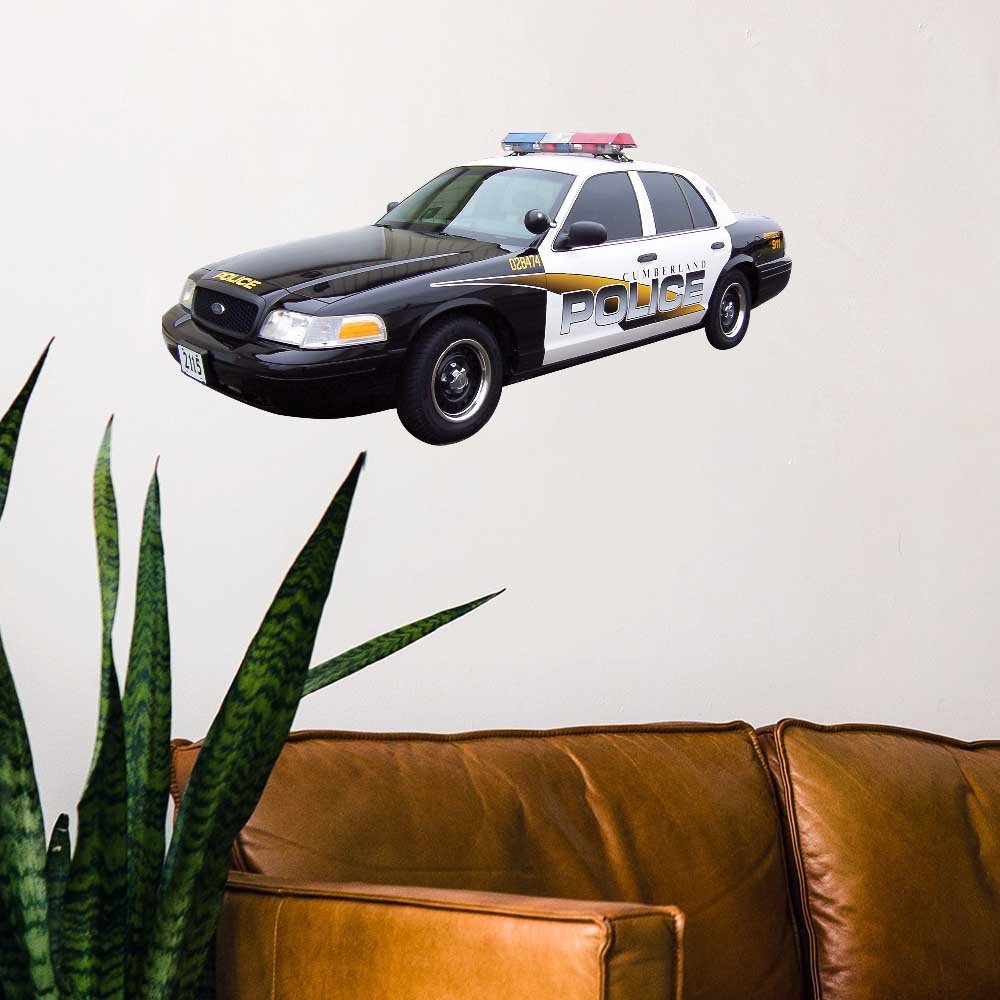11.5x24 inch Ford Interceptor Police Car Decal Installed Above Couch