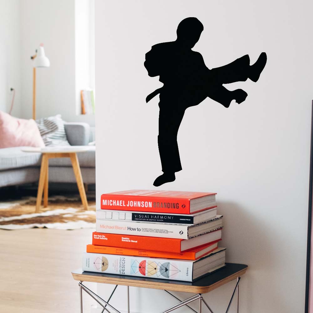 24 inch Martial Arts Kicking Silhouette Wall Decal Installed in Hallway