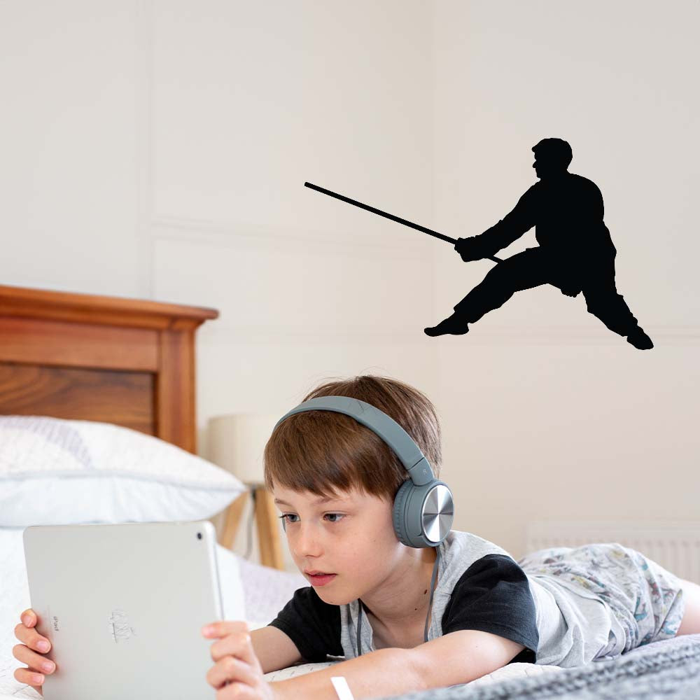 24 inch Martial Arts Staff Silhouette Wall Decal Installed in Boys Room