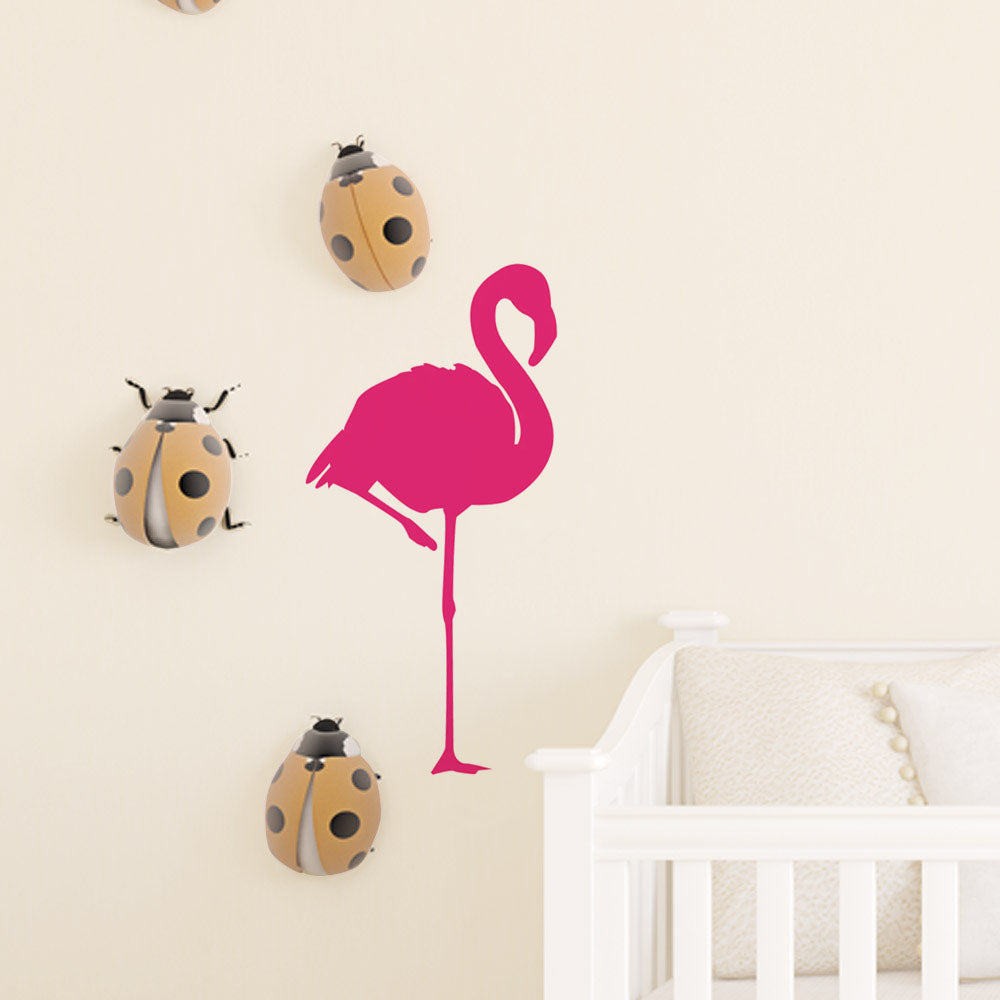 24 inch Pink Flamingo Silhouette Wall Decal Installed Next to Crib