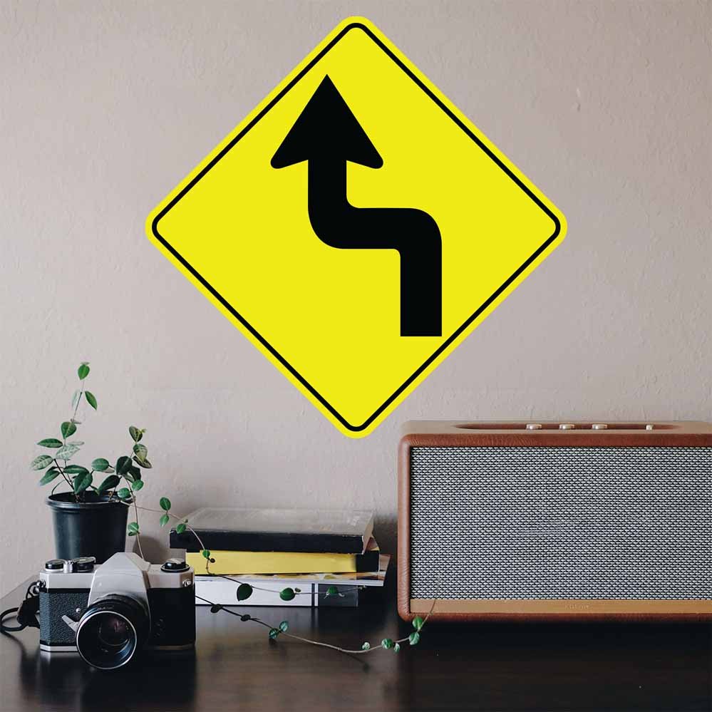 24 inch Sharp Turn Sign Wall Decal Installed Above Desk