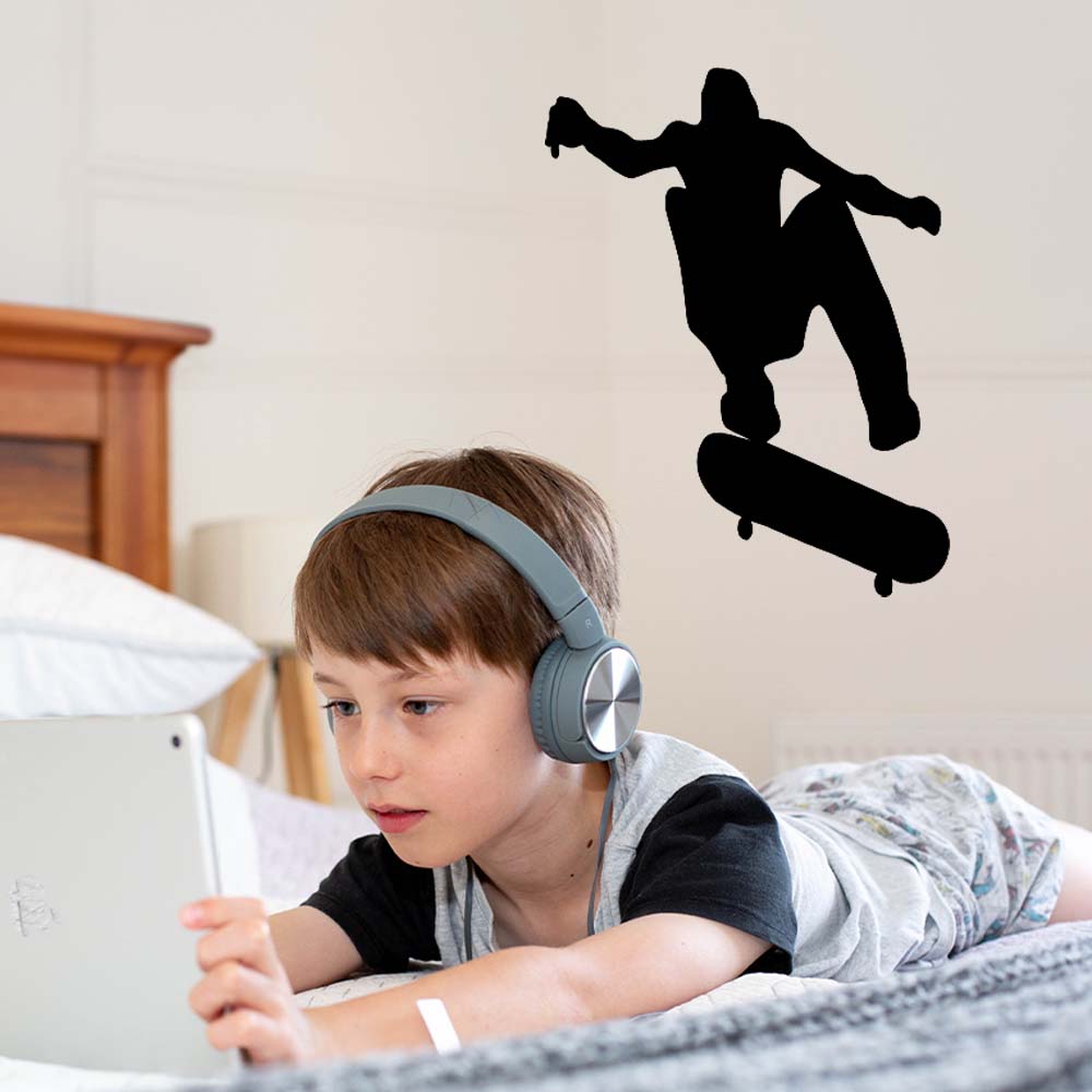 24 inch Skateboard Kickflip Silhouette Wall Decal Installed in Boys Room