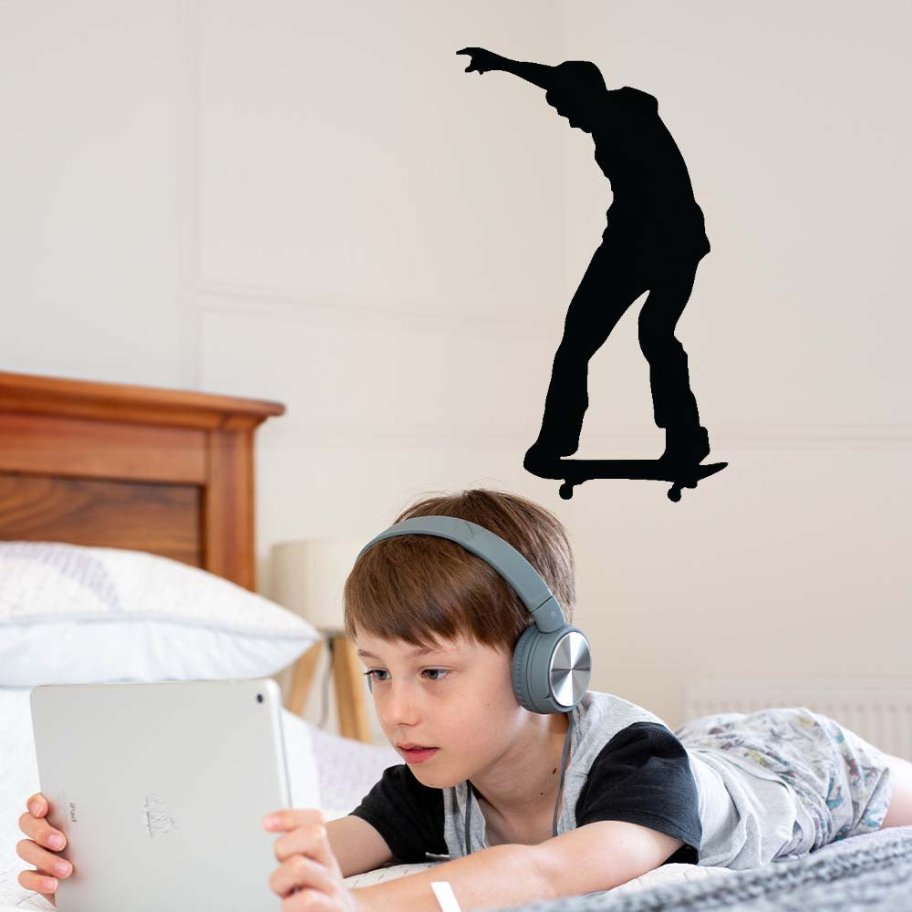 24 inch Skateboard Fontside Heelflip Silhouette Wall Decal Installed in Boys Room