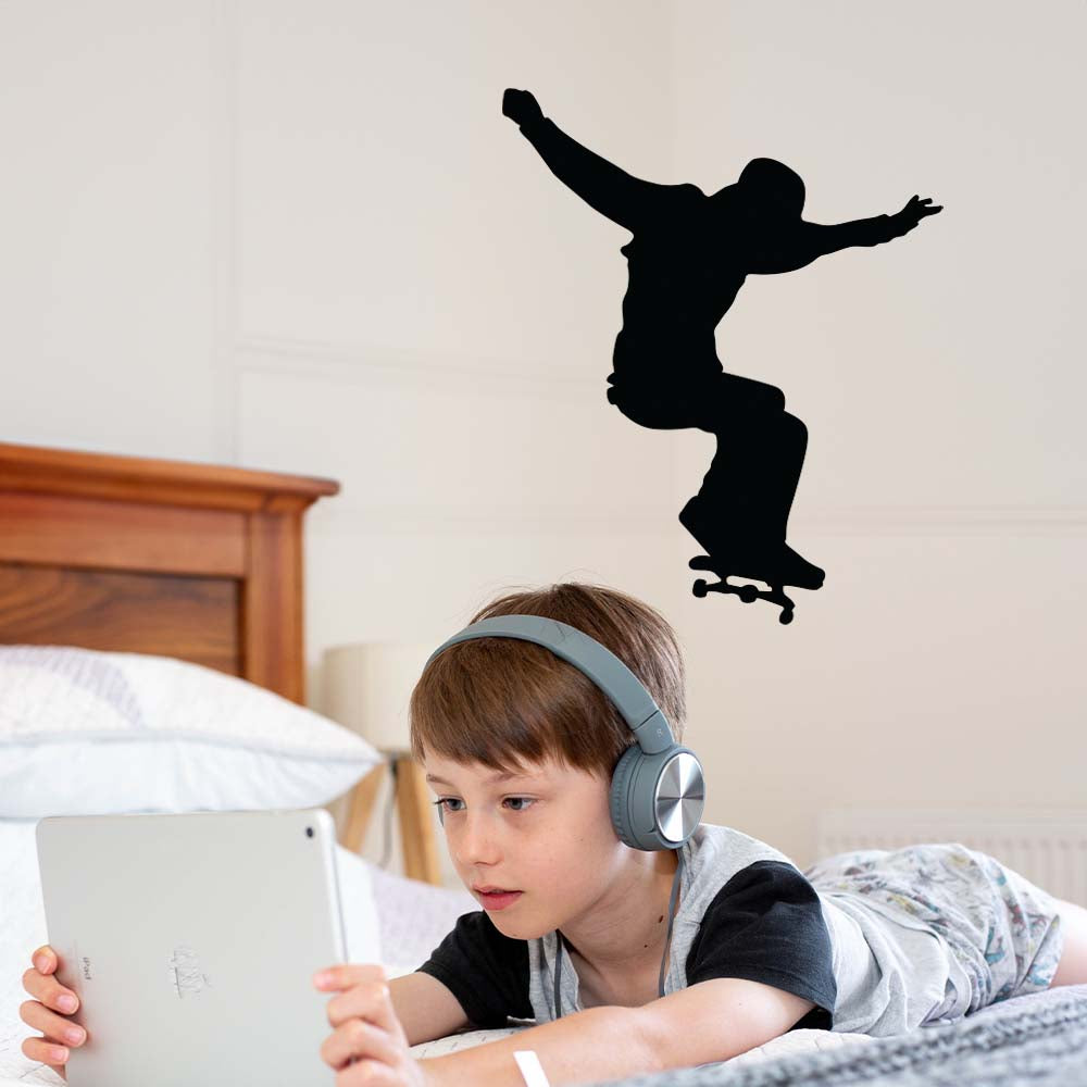 24 inch Skateboard Ollie Silhouette Wall Decal Installed in Boys Room