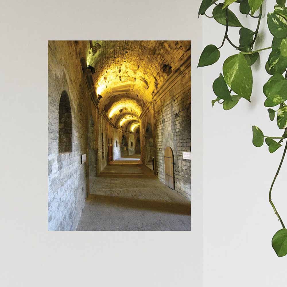 24 inch decal of a long, narrow hallway with arches in Nimes France Roman Arena installed on wall