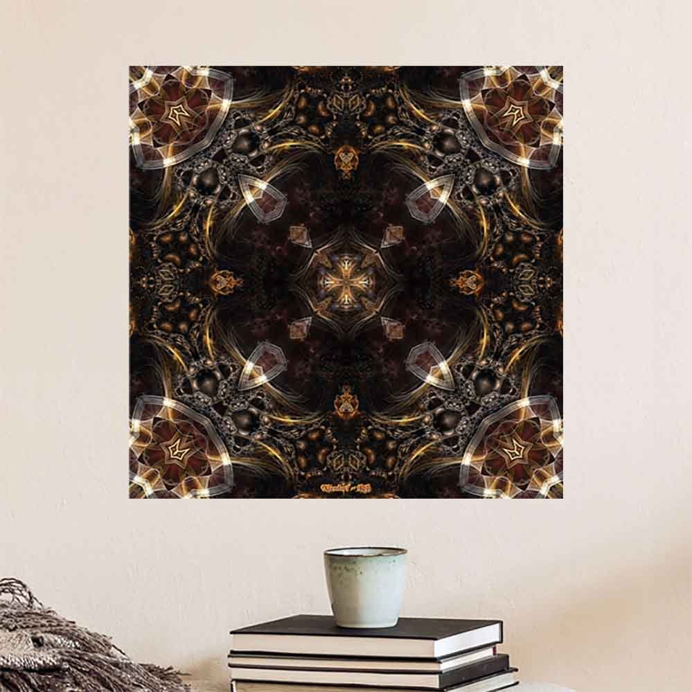 24 inch decal of a kaleidoscope of radiant gold, brown and bronze energy patterns with intricate designs and symmetrical arrangement installed on a wall above a stack of books and cup of coffee