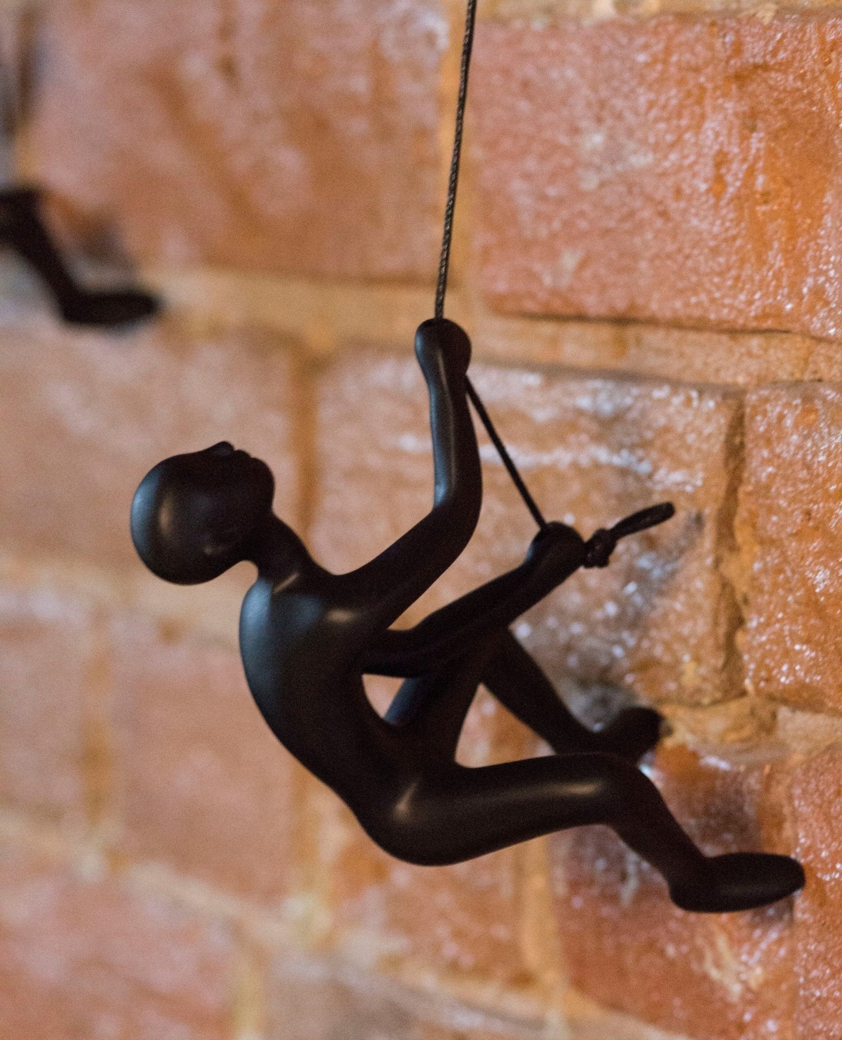 Climbing Man in Black Wall Art | 3.5
