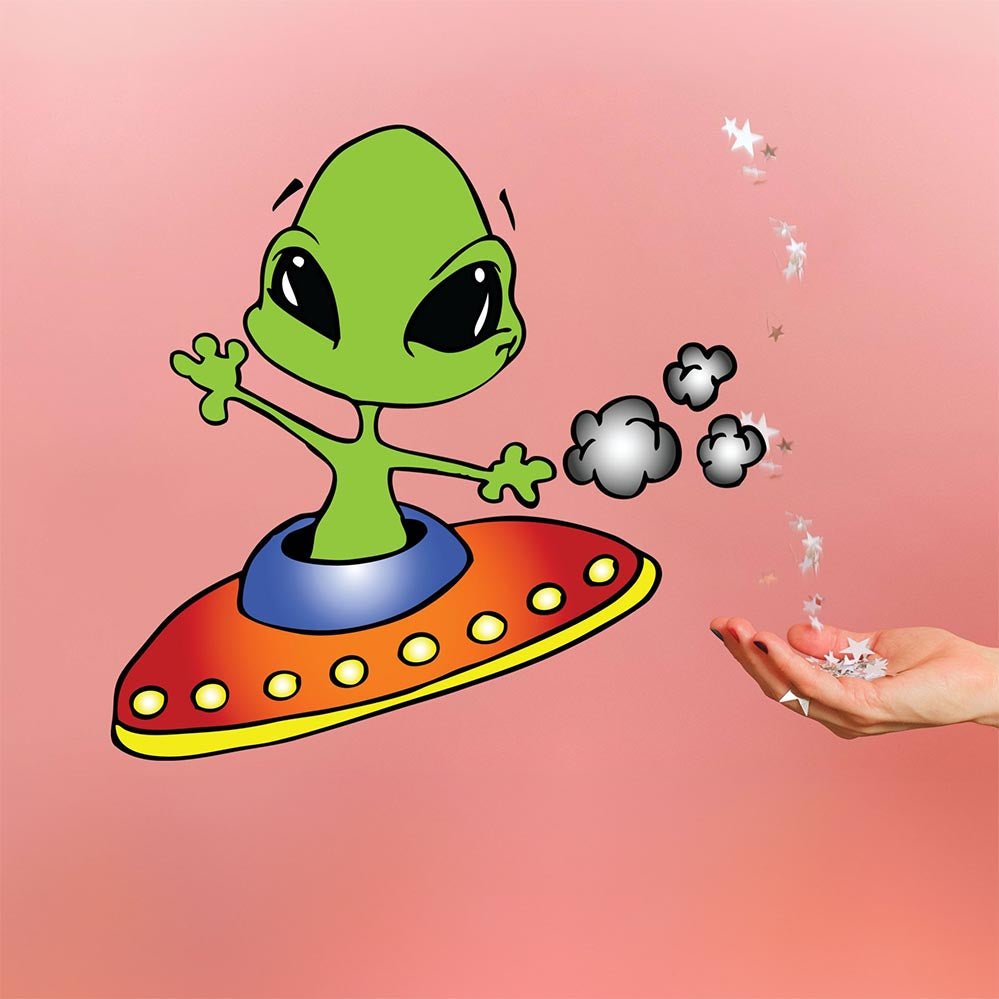 35x36 inch Cartoon alien on a UFO with a hand holding crystals installed on a pink wall