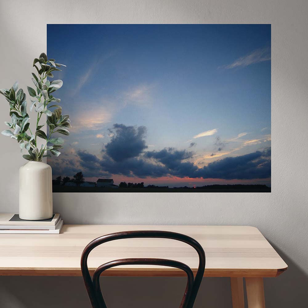 27x36 inch Clouds Poster Displayed Above Table