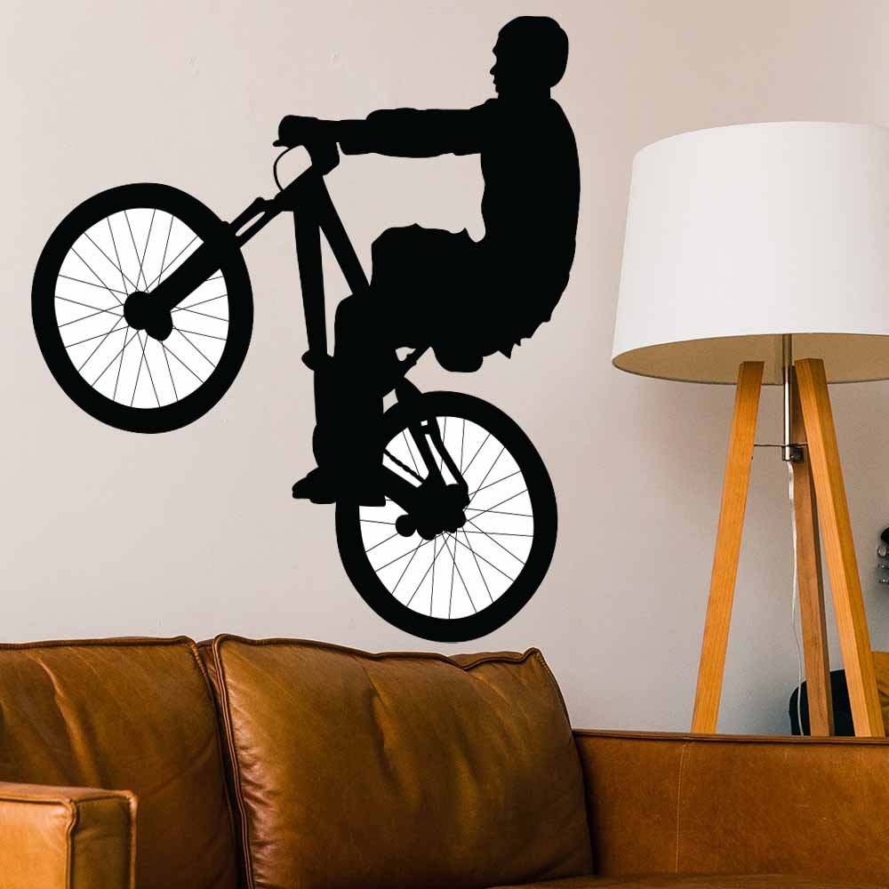 36 inch BMX Silhouette Big Wheelie Wall Decal Installed Above Couch