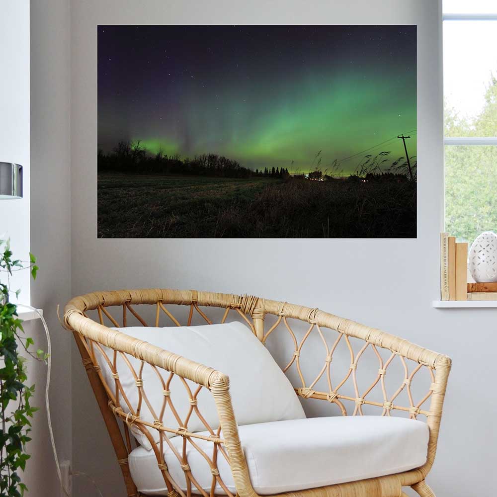 24x36 inch Northern Lights Poster Displayed Above Chair
