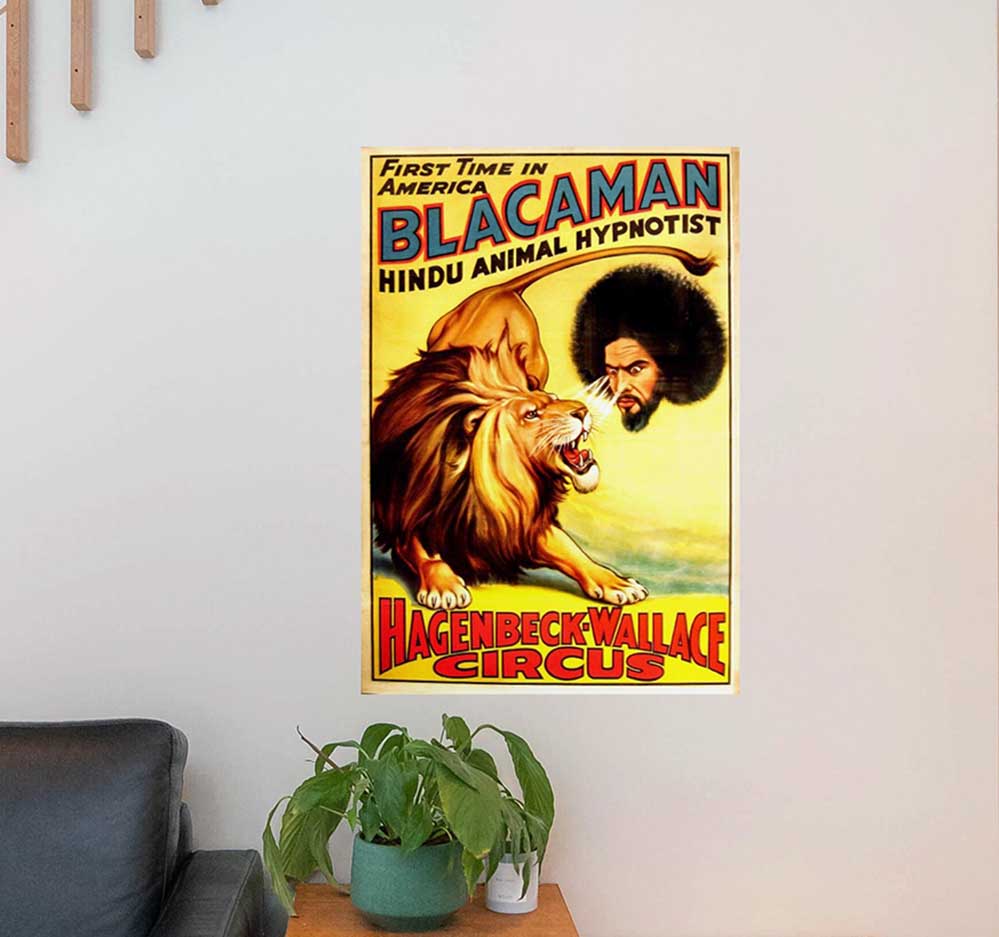 25x36 inch Blacaman Poster Displayed Above End Table