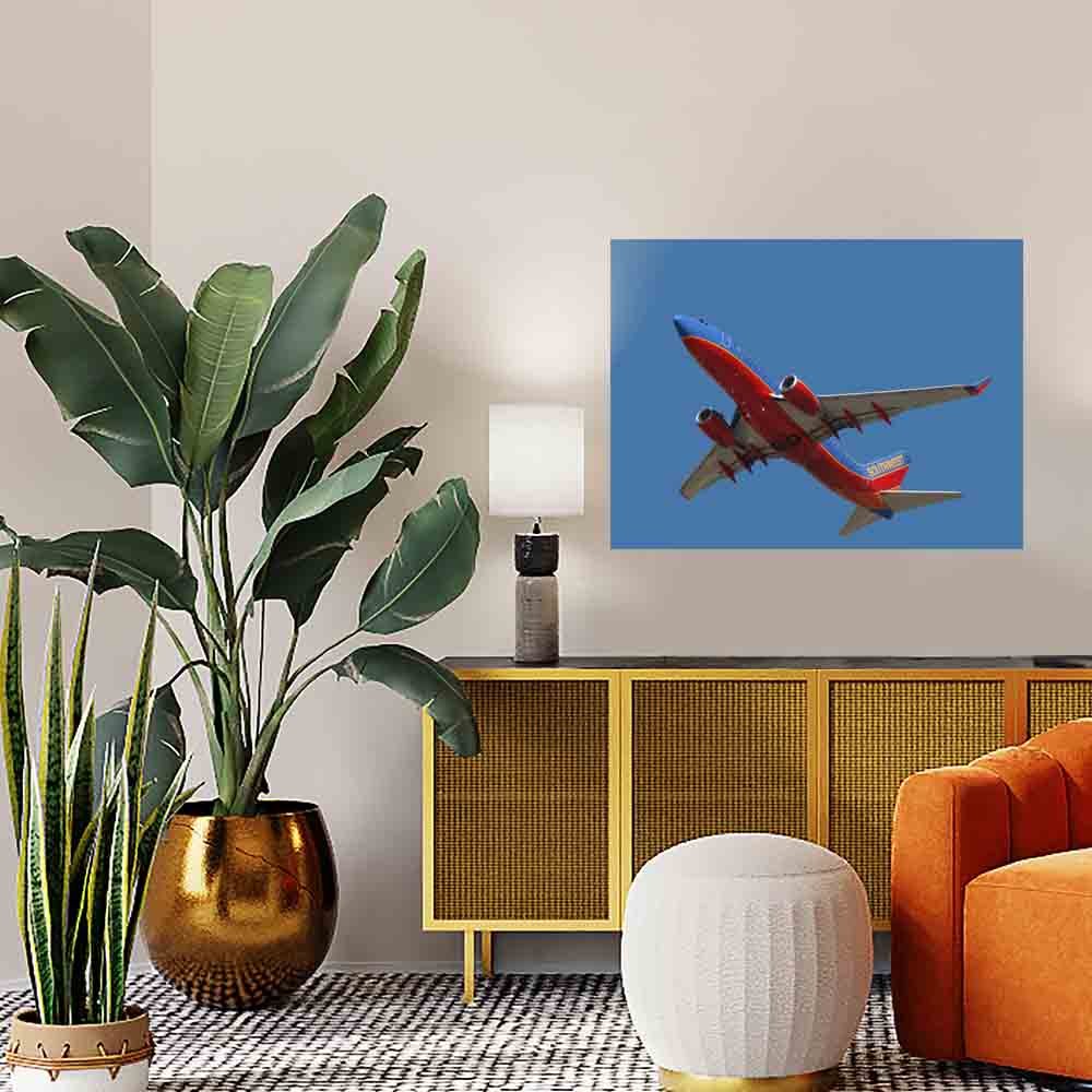 24x36 Southwest 737 Flyover Poster Displayed Above Console Table
