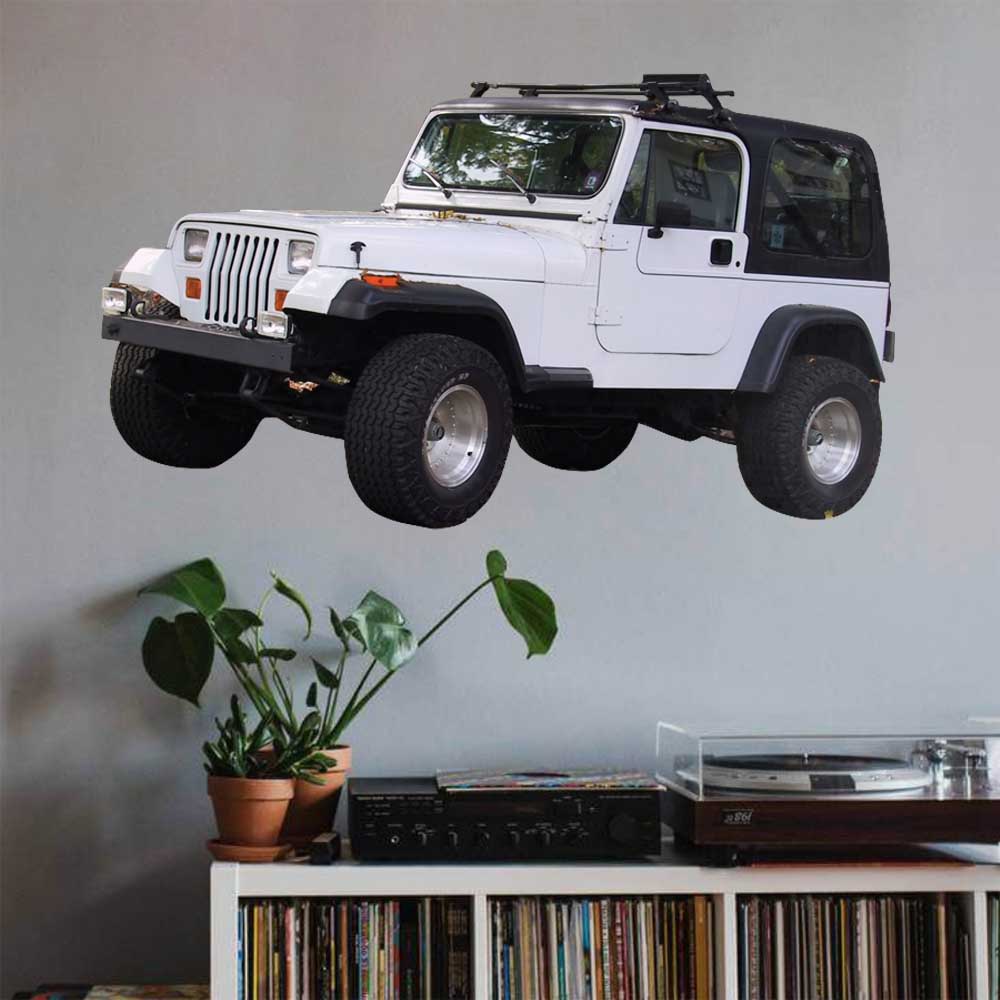 36 inch white Jeep  decal installed on a wall above a shelf with records and plants