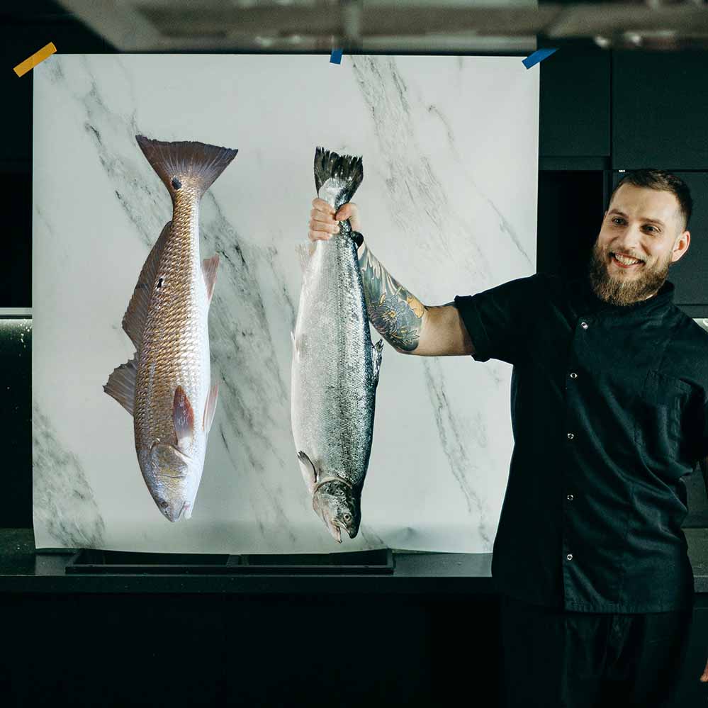 12.5x36 inch Red Drum Fish Decal Installed on Wall