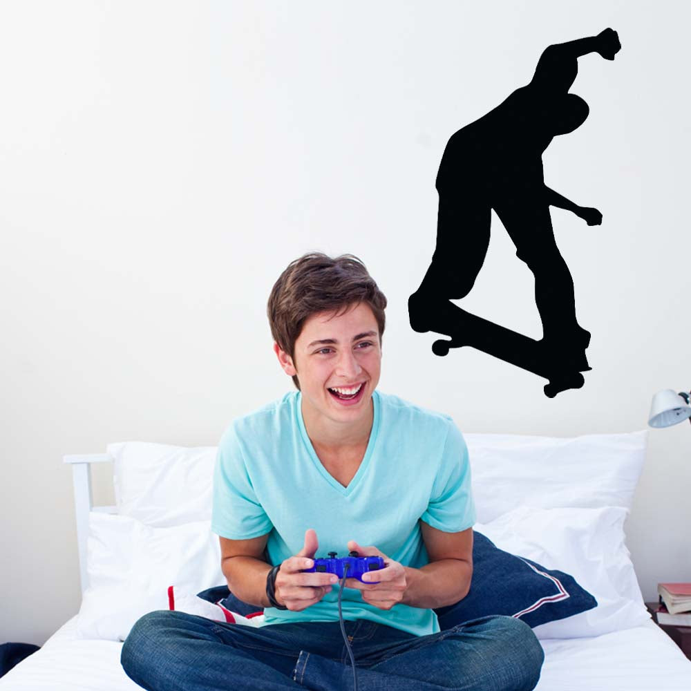 36 inch Skateboard Disaster Silhouette Wall Decal Installed in Teen Boys Room