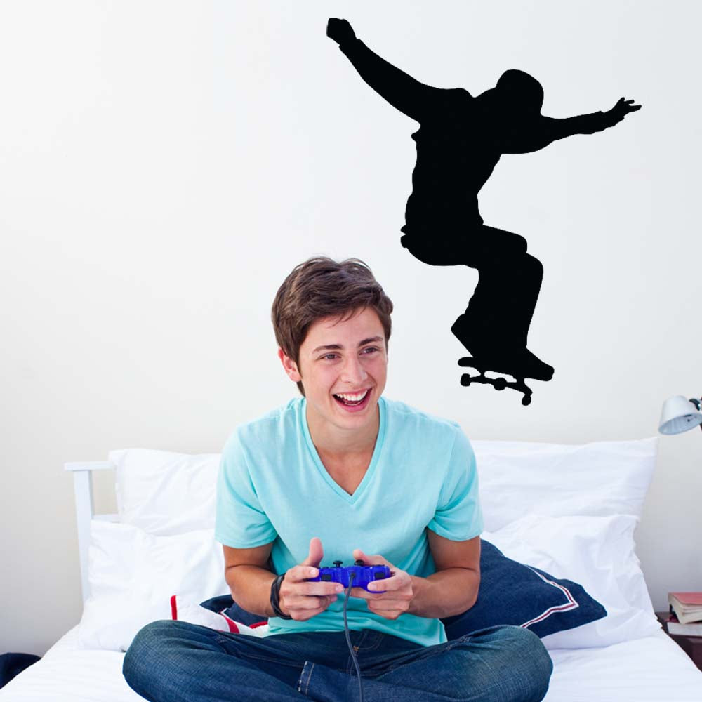 36 inch Skateboard Ollie Silhouette Wall Decal Installed in Teens Room