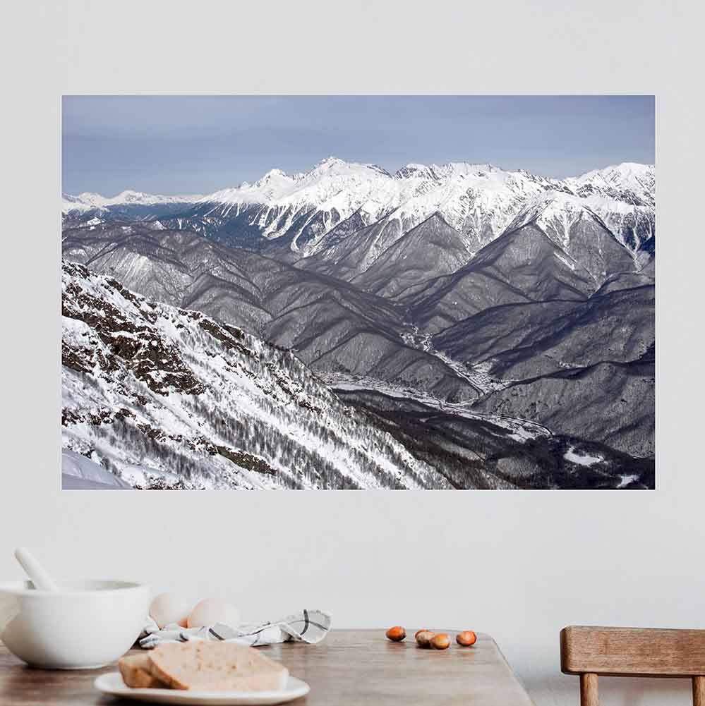 24x36 inch Snowy Mountain Poster Displayed Above Table