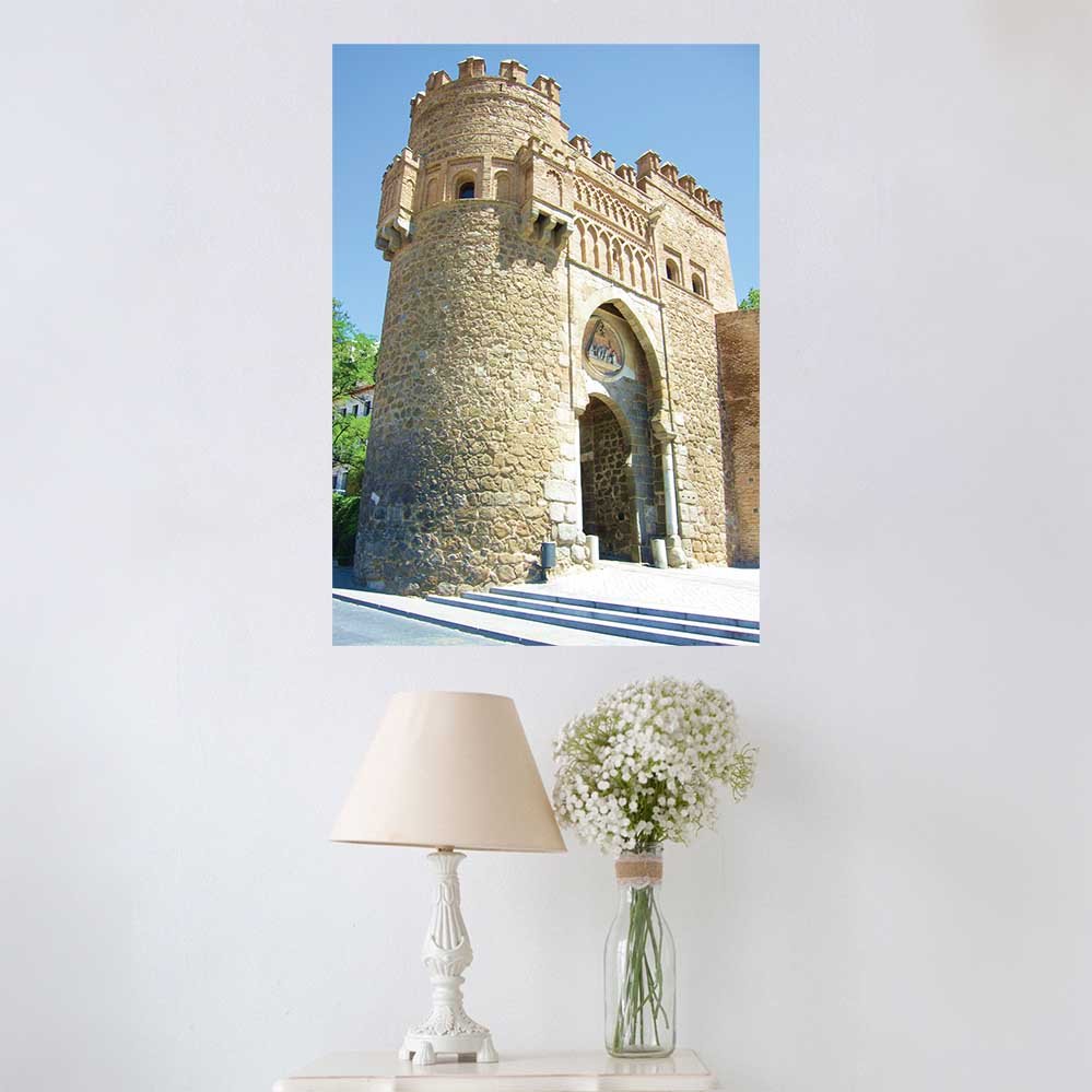36 inch decal of Moors Arch in Toledo Spain installed on a wall above a table with a lamp and vase of flowers