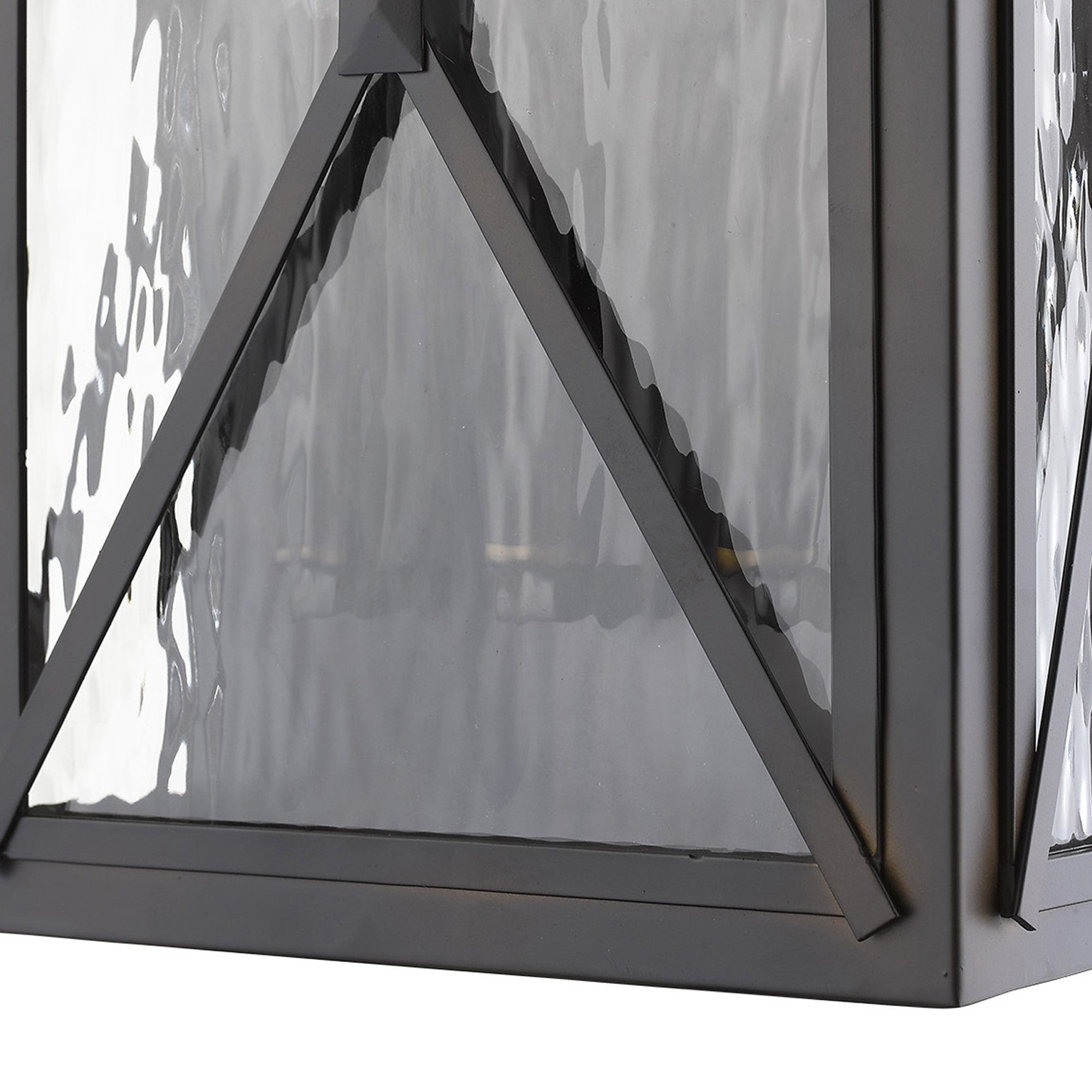 Zoomed in view of the bottom section of the Brooklyn 3-Light Oil-Rubbed Bronze Wall Light with Clear Water Glass and Criss-Cross Frame