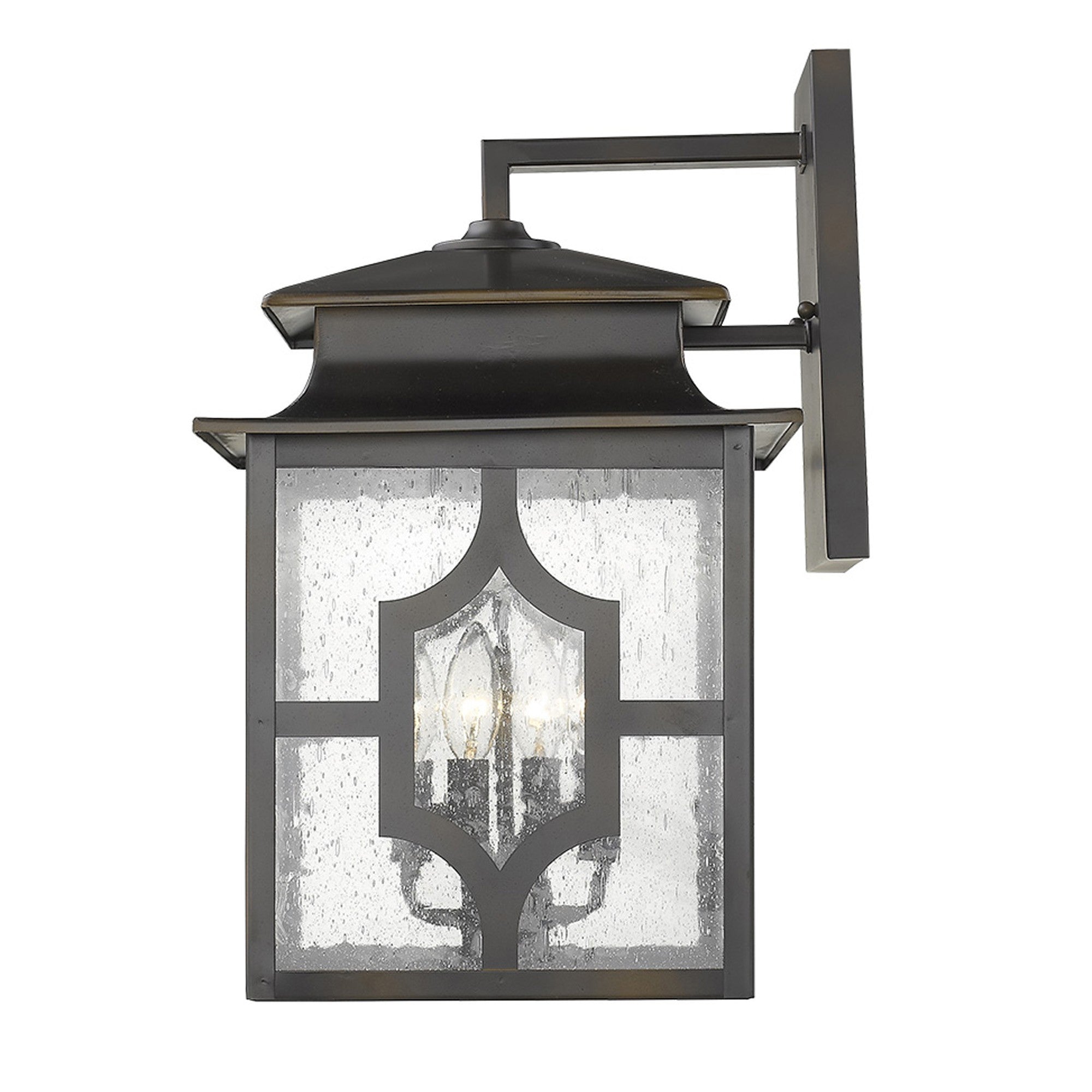 Side view of the lighted Calvert 4-Light Oil-Rubbed Bronze Wall Lantern with Seeded Glass Panels