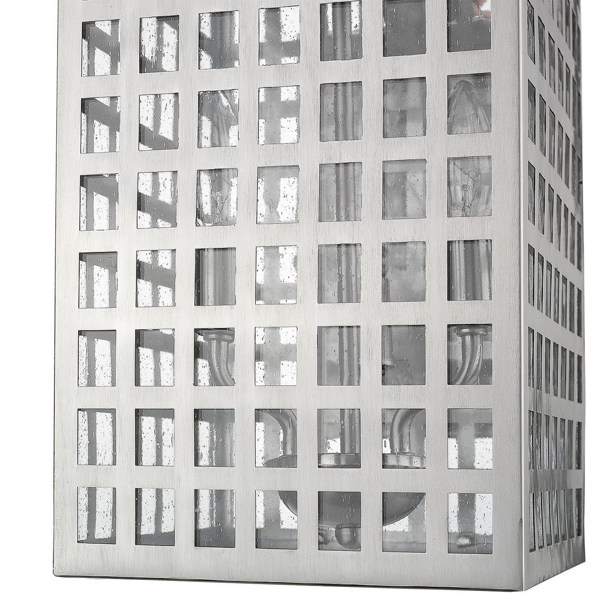Zoomed in view of the grid cage and glass of the Letzel 3-Bulb Satin Nickel Wall Light with Grid Pattern and Seedy Glass