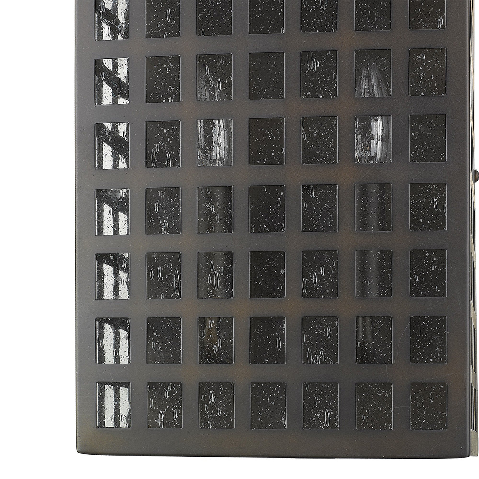 Zoomed in view of the bottom part of the Letzel 2-Bulb Oil-Rubbed Bronze ADA Wall Sconce with Grid Pattern and Seedy Glass
