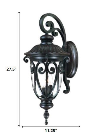 Naples 3-Bulb Marbleized Mahogany Outdoor Hanging Wall Light with Seeded Glass shown with dimensions of 27 point 5 inches high by 11 point 25 inches wide