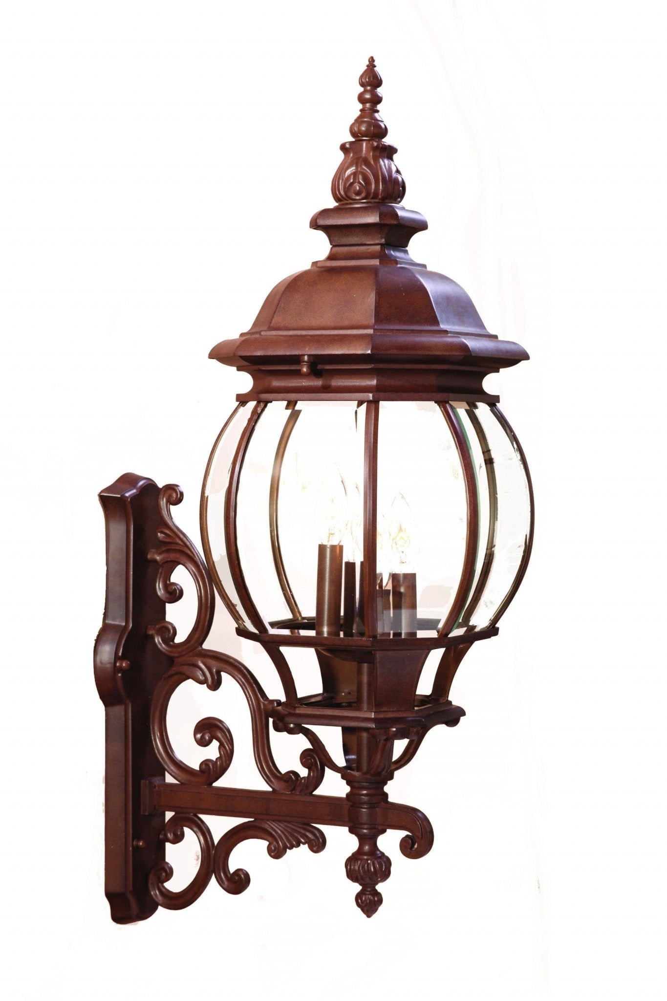 Front left angle view of the lighted Chateau 4-Bulb Burled Walnut Outdoor Wall Lantern with Scrollwork and Beveled Glass