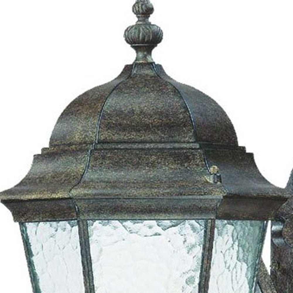 Close up view of the lantern top of the Telfair 3-Bulb Black Coral Outdoor Wall Lantern with Hammered Glass and Traditional Scroll Arm