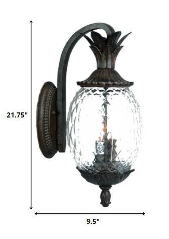 Lanai 3-Bulb Black Coral Outdoor Wall Lantern with Pineapple Design and Textured Glass shown with dimensions of 21 point 75 inches high by 9 point 5 inches wide