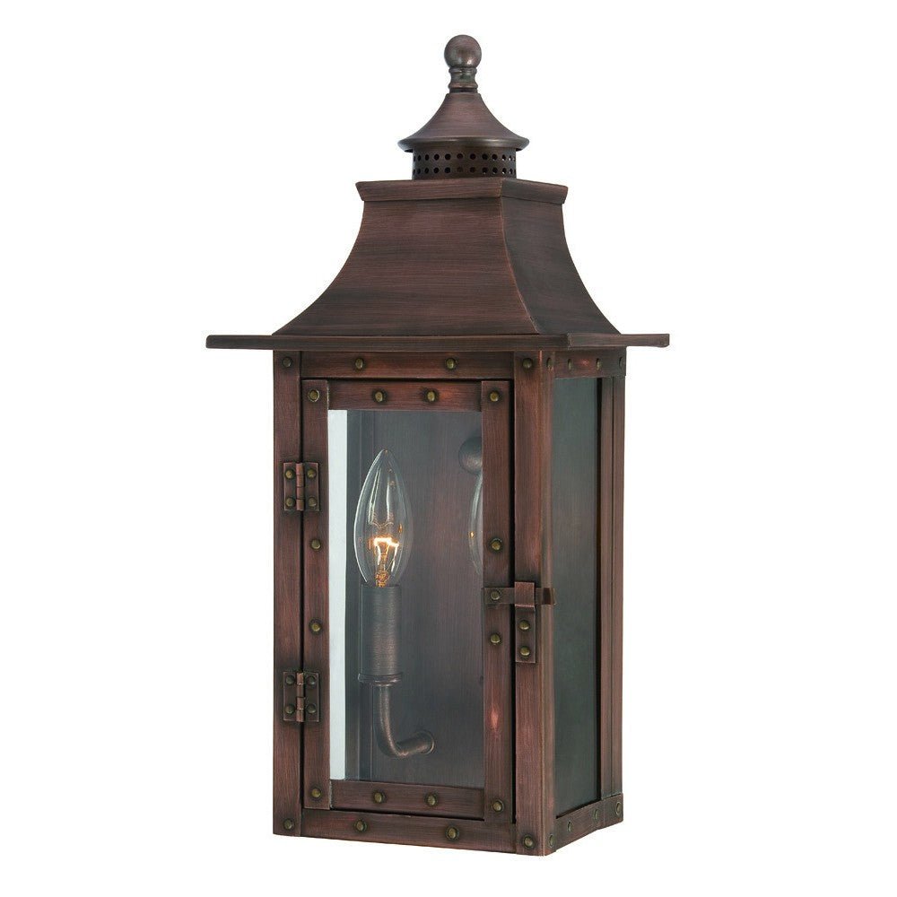 Front right angle view of the lighted St. Charles 2-Bulb Copper Patina Colonial Outdoor Wall Lantern Light