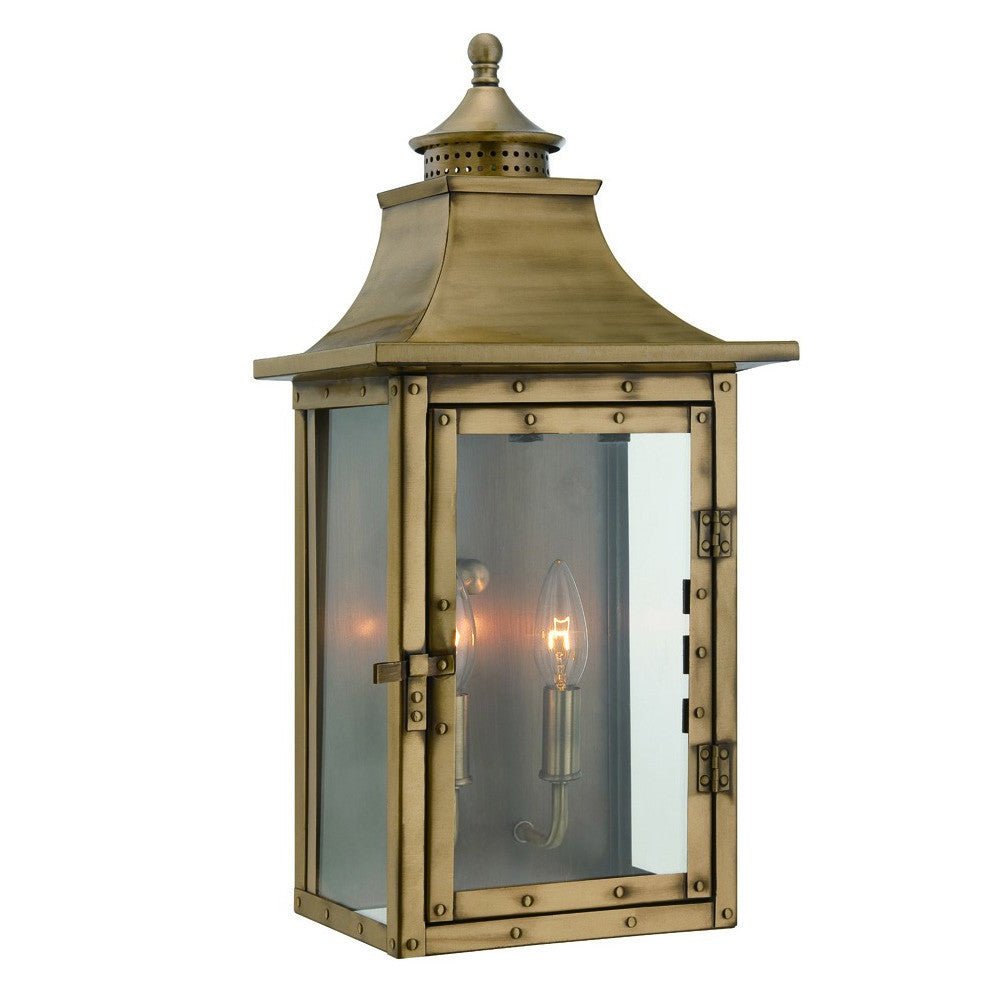 Front left angle view of the lighted St. Charles 2-Bulb Aged Brass Colonial Outdoor Wall Lantern Light 10x20