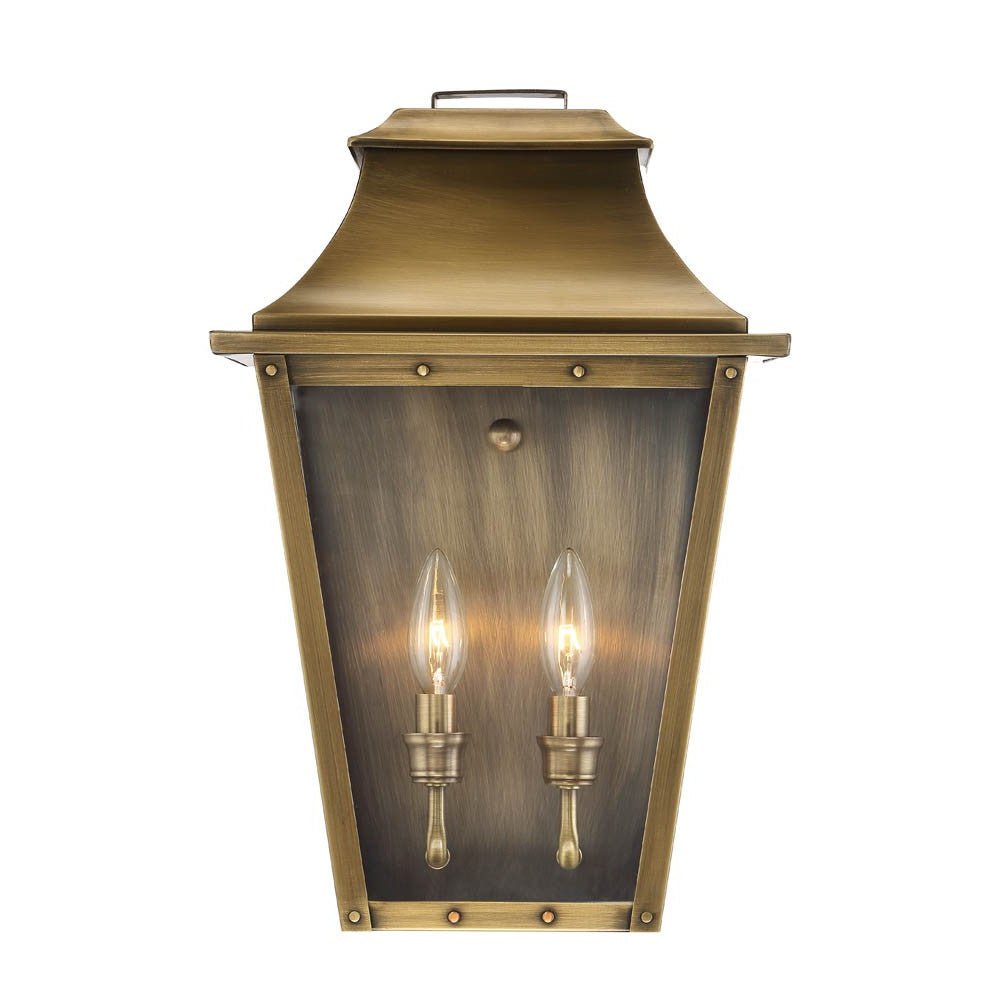 Zoomed in Front view of the lighted Coventry 2-Bulb Aged Brass Pocket Wall Lantern with Clear Glass Panels – Outdoor Indoor Lighting Fixture