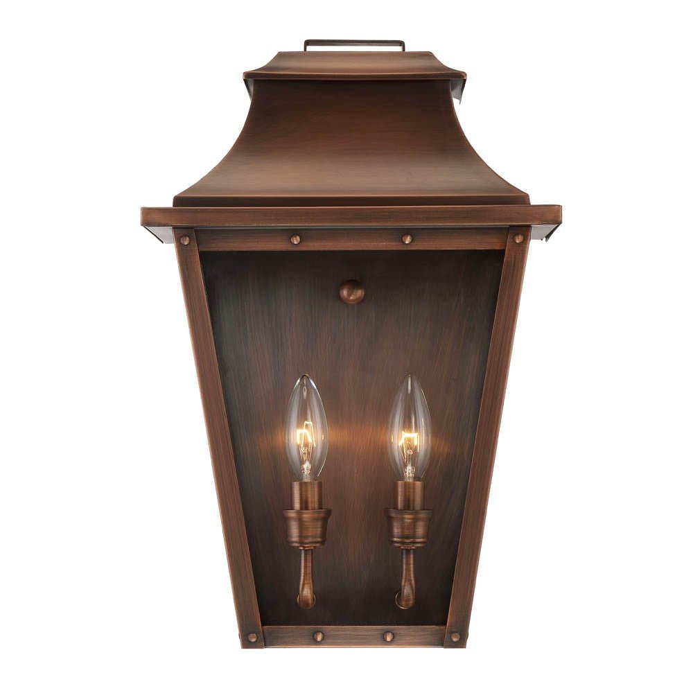 Front view of the lighted Coventry 2-Bulb Copper Patina Pocket Wall Lantern with Clear Glass Panels – Outdoor Indoor Lighting Fixture