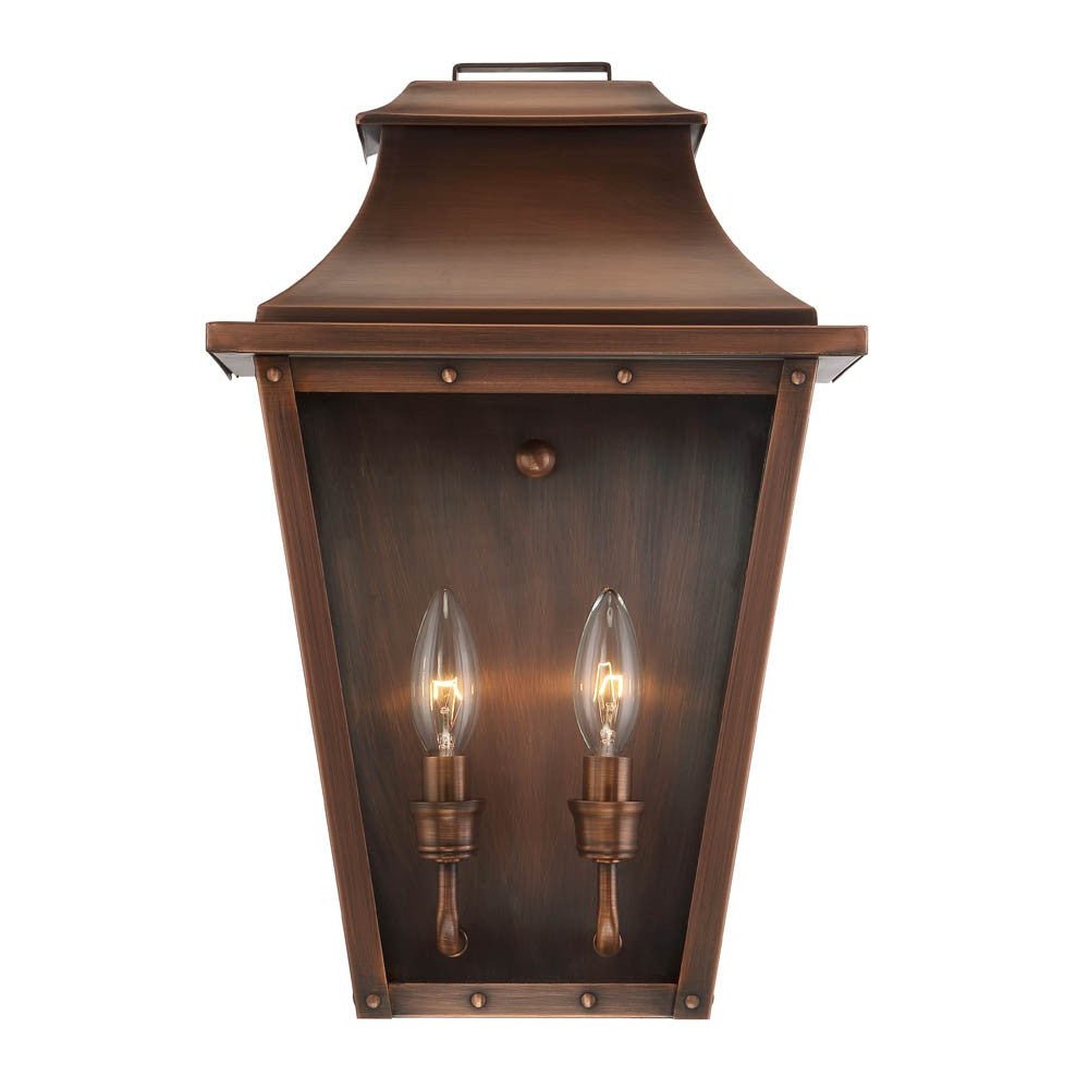 Zoomed in Front view of the lighted Coventry 2-Bulb Copper Patina Pocket Wall Lantern with Clear Glass Panels – Outdoor Indoor Lighting Fixture