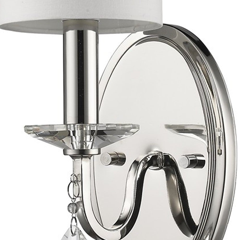 Zoomed in view of the wall plate, arm, and base of fixture of the Silver Wall Sconce with White Fabric Shade and Crystal Teardrop Accent – Elegant Lighting