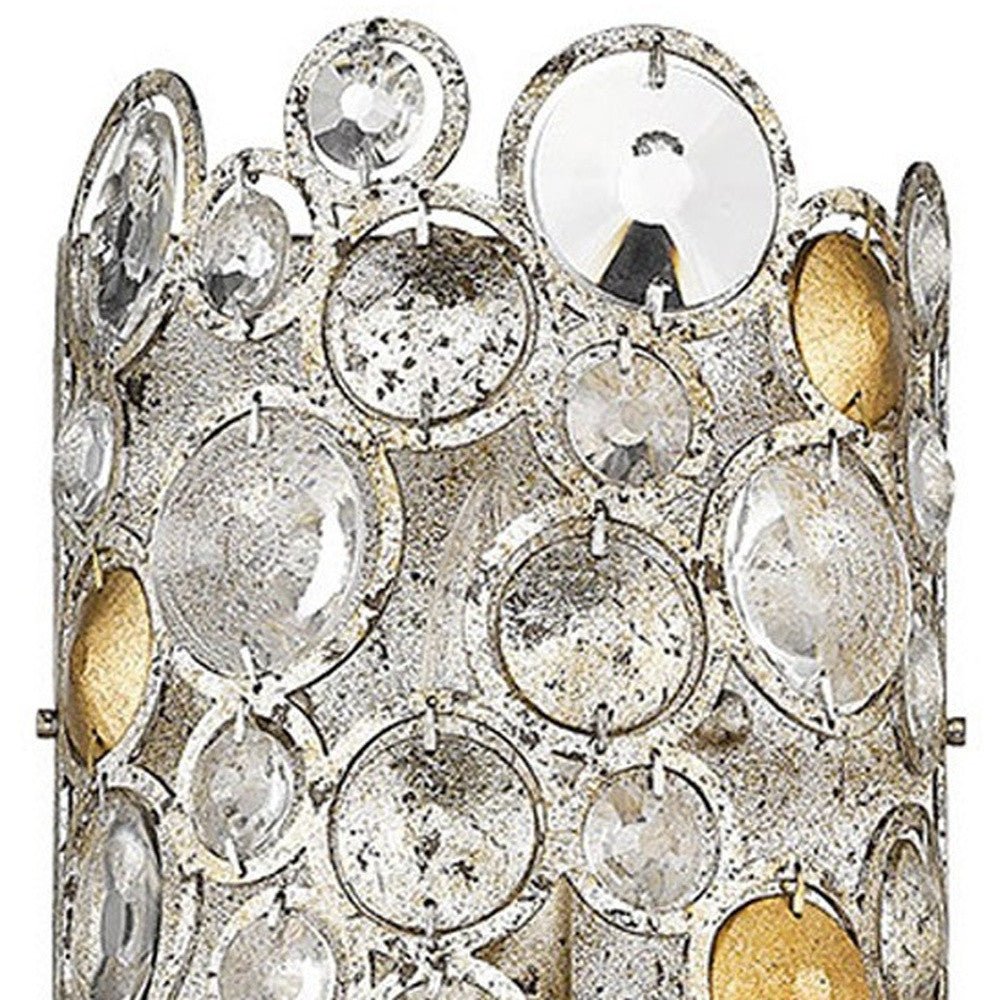 Zoomed in view of the silver and gold leaf of the Vitozzi tri-bulb antique silver leaf wall sconce with K9 crystals luxury wall light for entryway or living room