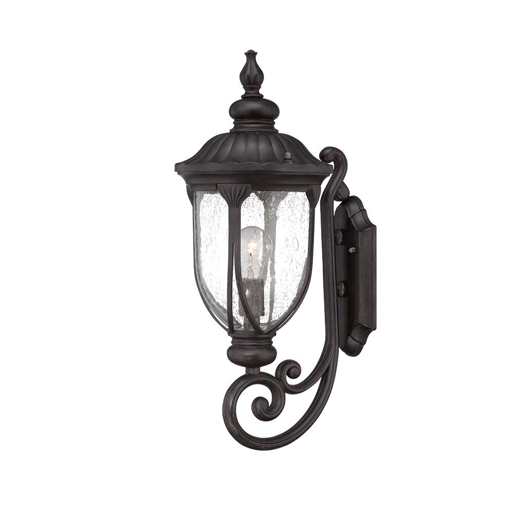 Right side angled view of the lighted XL black cast aluminum standing lantern outdoor wall light with clear glass panels