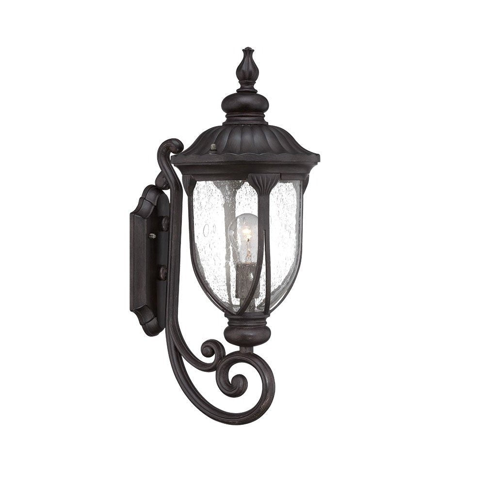 Left side angled view of the lighted XL black cast aluminum standing lantern outdoor wall light with clear glass panels