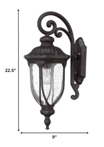 XL black cast aluminum outdoor hanging lantern wall sconce with clear glass panels shown with dimensions of 22 point 5 inches high by 9 inches deep