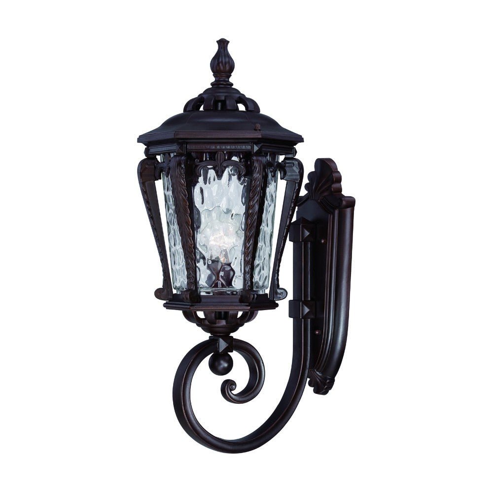 Right side angled view of the Architectural bronze outdoor wall light with hammered glass and scroll detailing