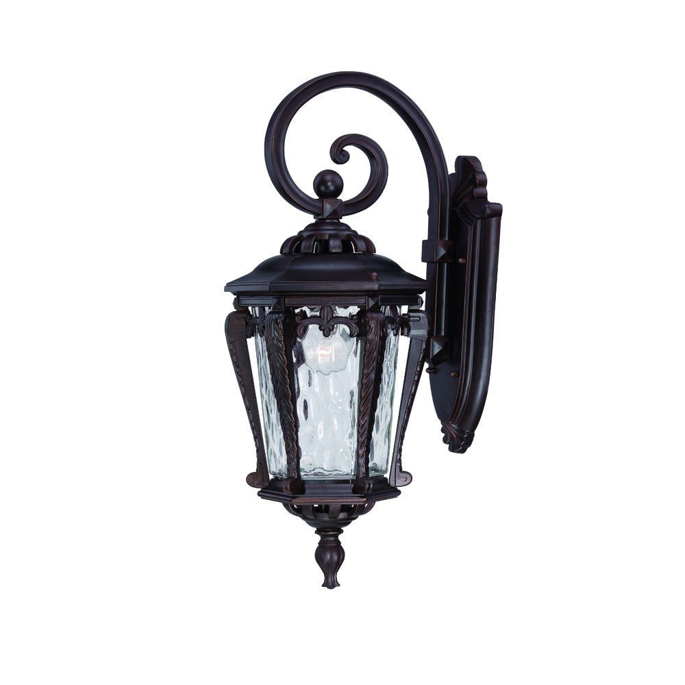 Right side angled view of the lighted Architectural bronze hanging outdoor wall light with hammered glass shade