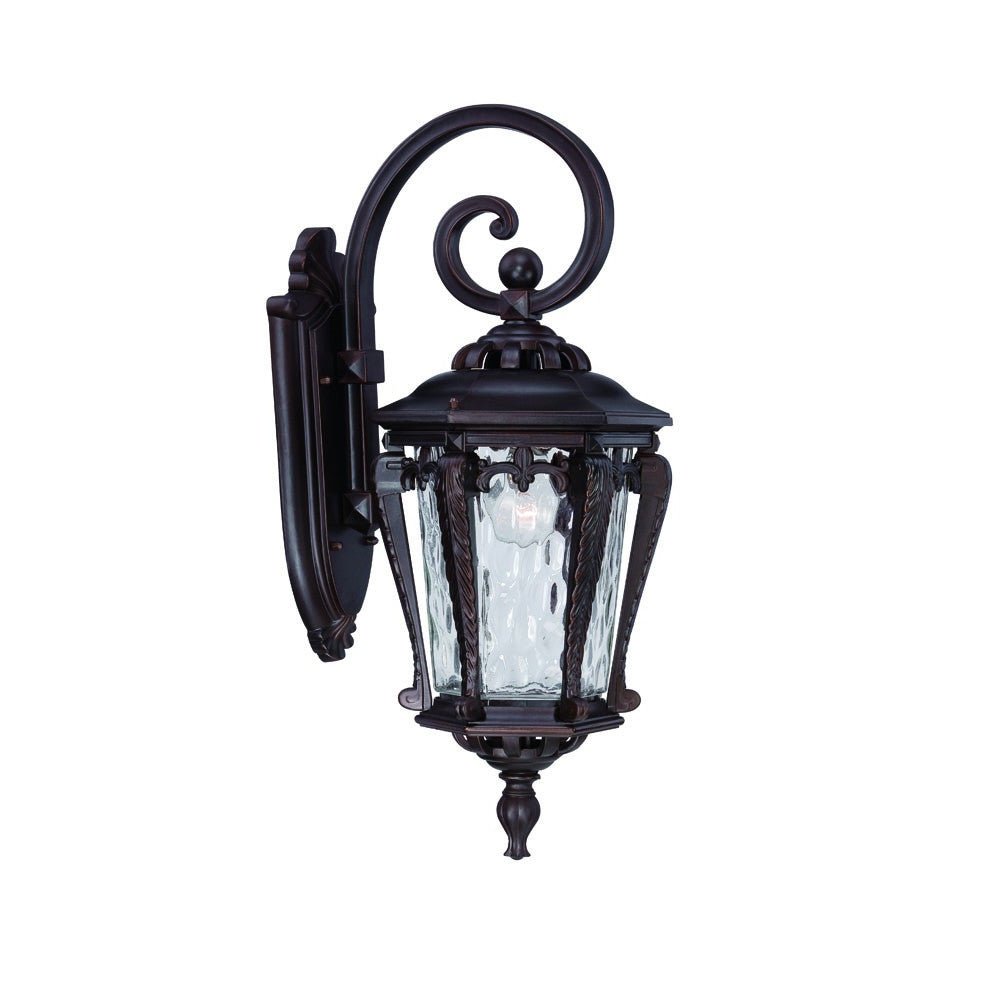 Left side angled view of the lighted Architectural bronze hanging outdoor wall light with hammered glass shade