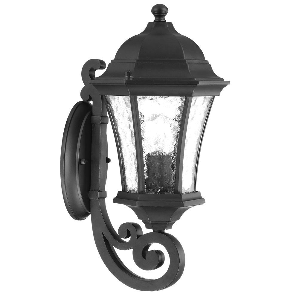 Left side angled view of the Matte black tapered outdoor lantern wall light with hammered glass panels
