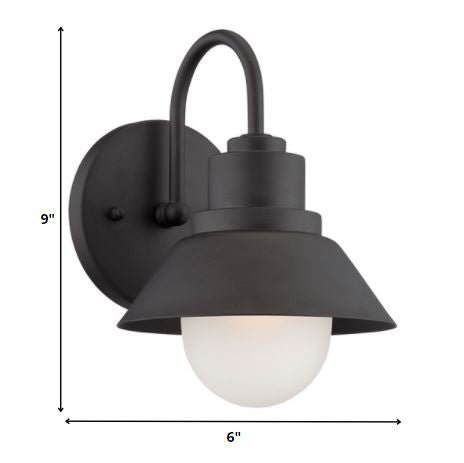 Matte black outdoor wall light with lamp shade design and frosted glass globe – modern weather-resistant steel exterior wall lighting fixture shown with dimensions of 9 inches high by 6 inches wide
