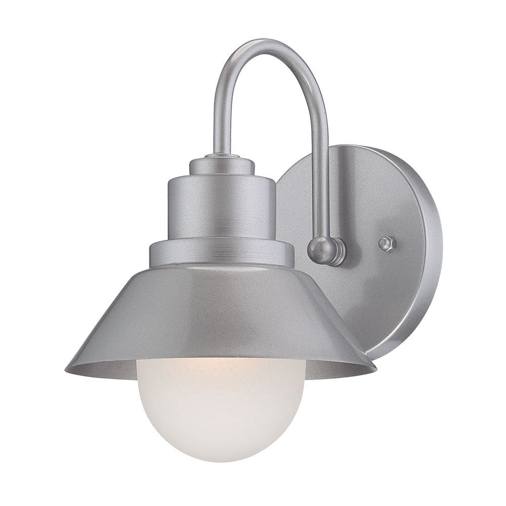 Right side angled view of the lighted Brushed silver outdoor wall light with lamp shade design and frosted glass globe – modern weather-resistant steel exterior wall lighting fixture.